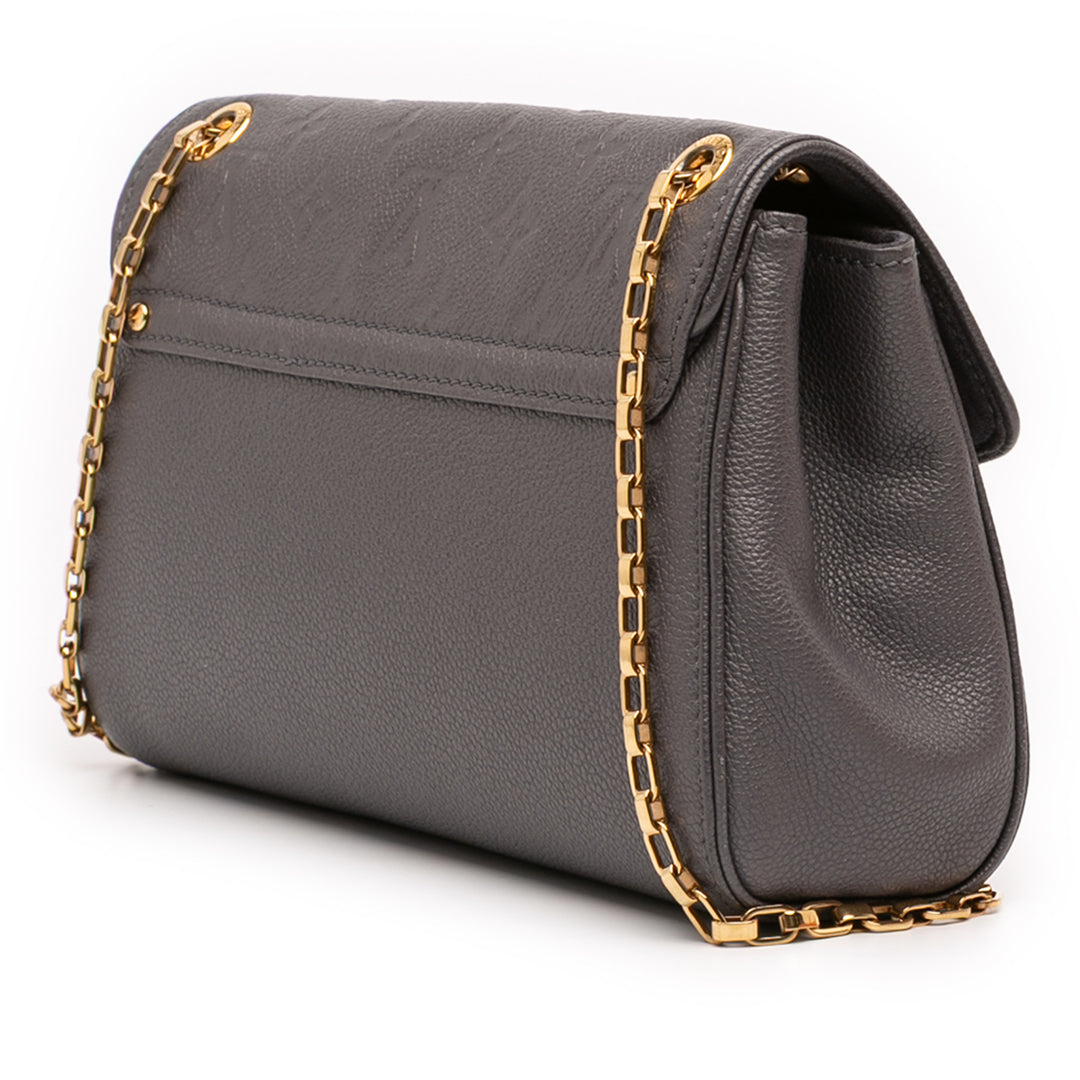 Louis Vuitton Monogram Empreinte Studded Saint Germain PM Gris – GABY PARIS Authentique