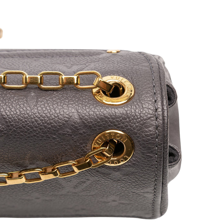 Louis Vuitton Monogram Empreinte Studded Saint Germain PM Gris – GABY PARIS Authentique