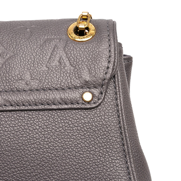 Louis Vuitton Monogram Empreinte Studded Saint Germain PM Gris – GABY PARIS Authentique