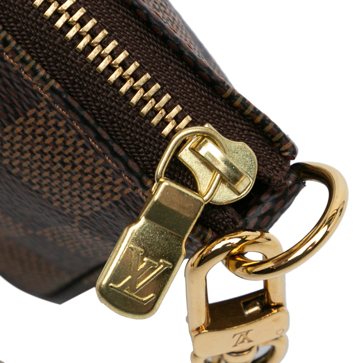 Damier Ebene Mini Pochette Accessoires Brown - Gaby Paris