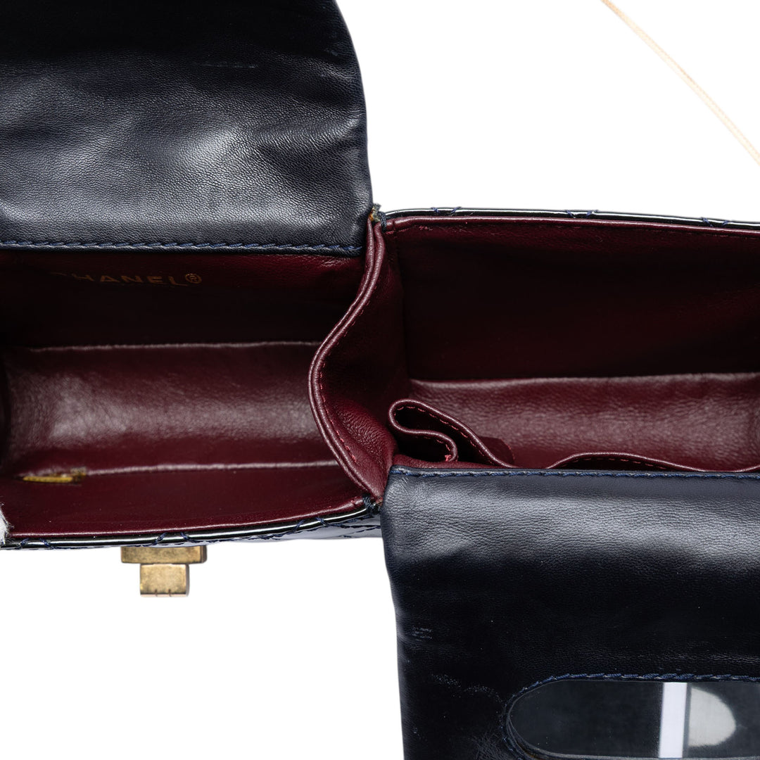 Chanel Matelassé Cuir verni Reissue 2.55 Reversible Chain à rabat