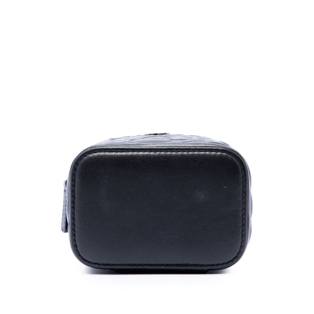 Chanel Mini Camellia embossé Cuir d’agneau Vanity avec chaîne