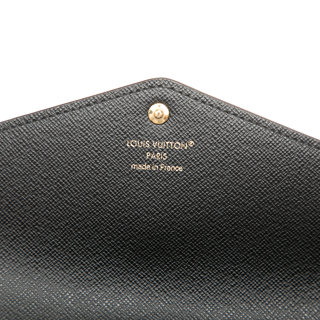 Louis Vuitton Giant Sarah Portefeuille long Monogram Reverse Marron – vue 5 – GABY PARIS