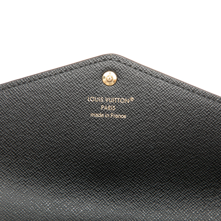 Louis Vuitton Giant Sarah Portefeuille long Monogram Reverse Marron – vue 5 – GABY PARIS