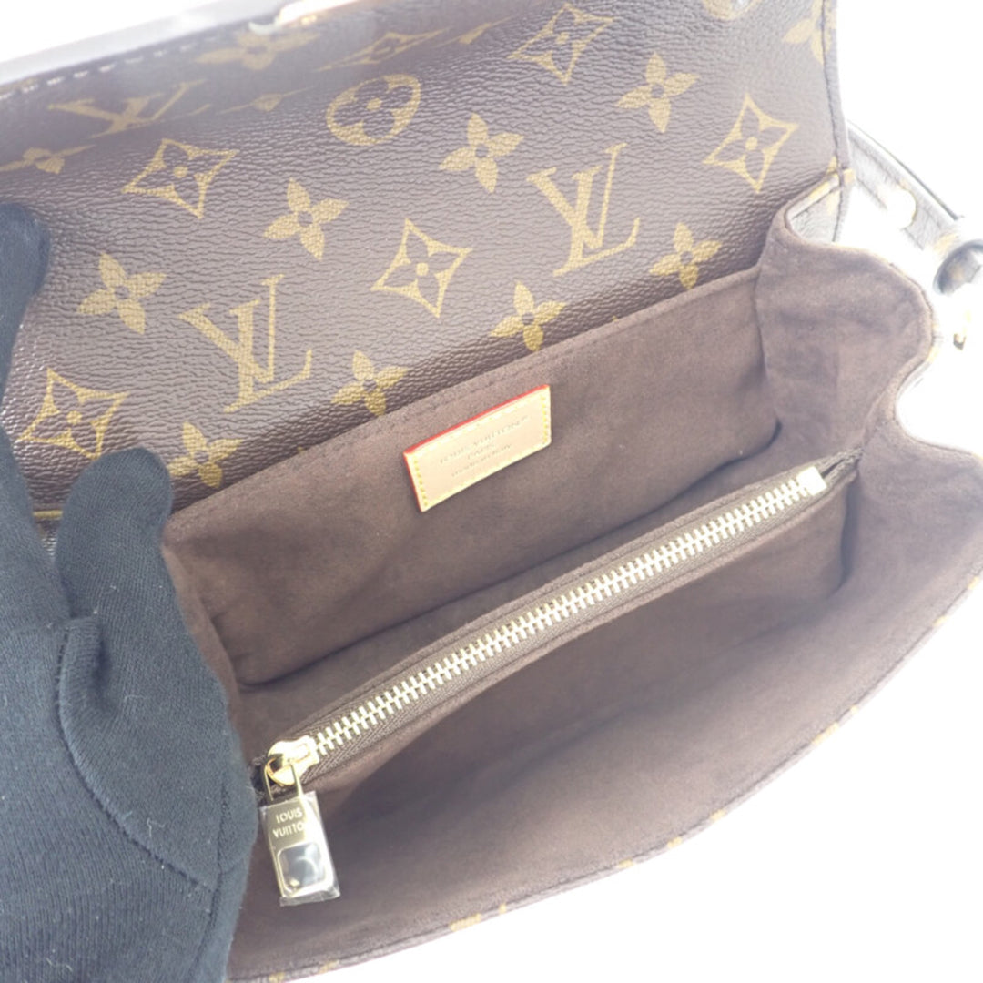 Pochette Métis East West Monogram Marron