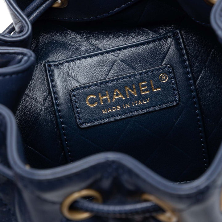 Chanel CC Matelassé Cuir d’agneau Drawstring Bucket Sac