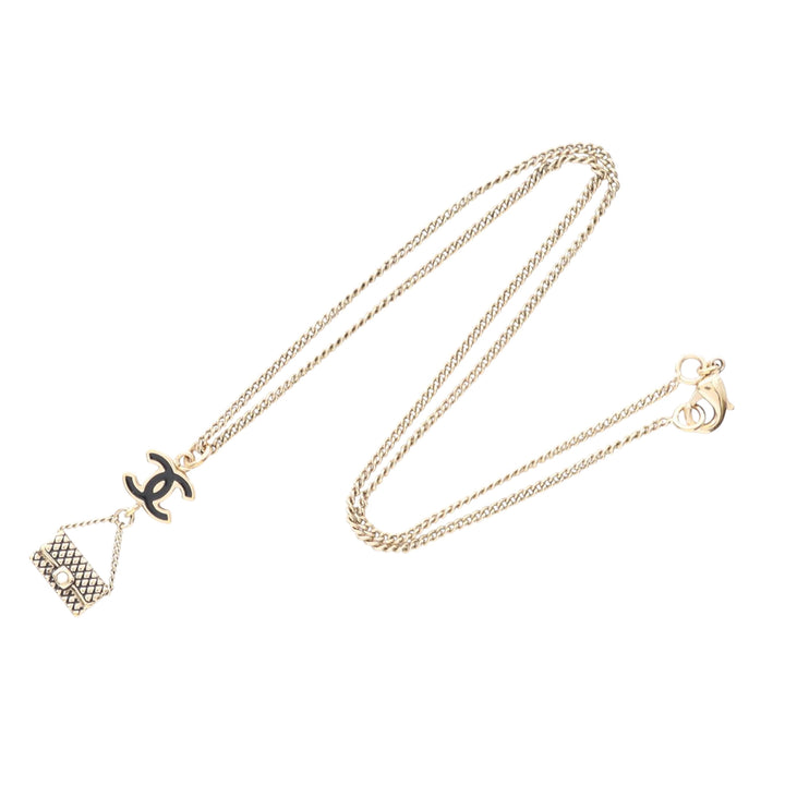 Chanel CC Doré Plated Enamel Flap Bag Pendant Collier Doré – GABY PARIS Authentique