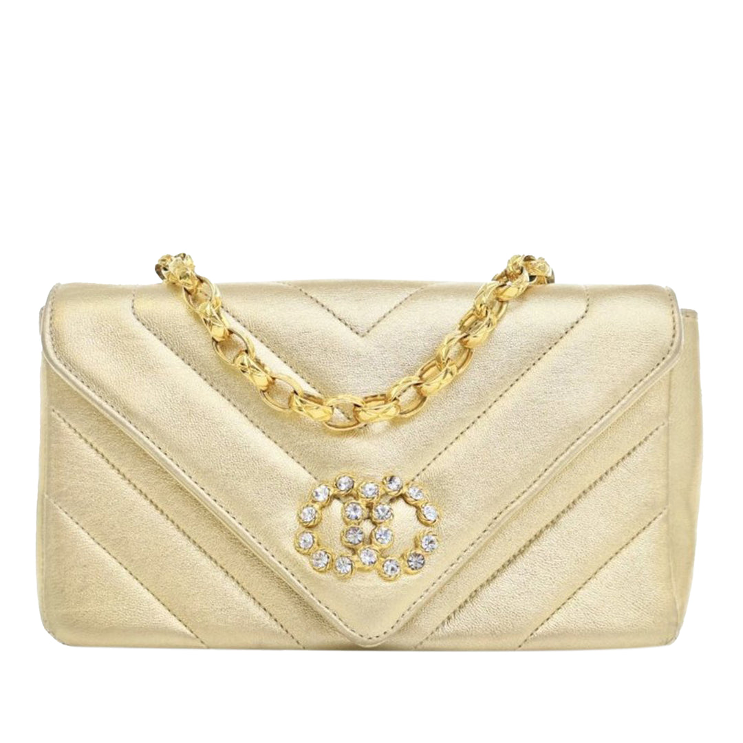 Small Chevron Metallic Lambskin V Stitch Bijoux Flap Gold - Gaby Paris