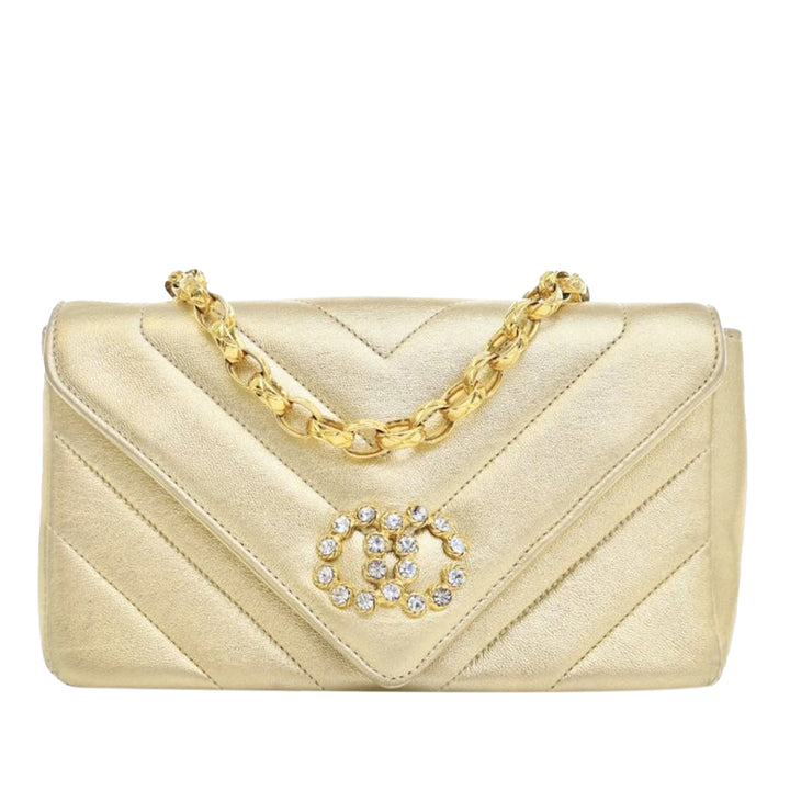Small Chevron Metallic Lambskin V Stitch Bijoux Flap Gold - Gaby Paris