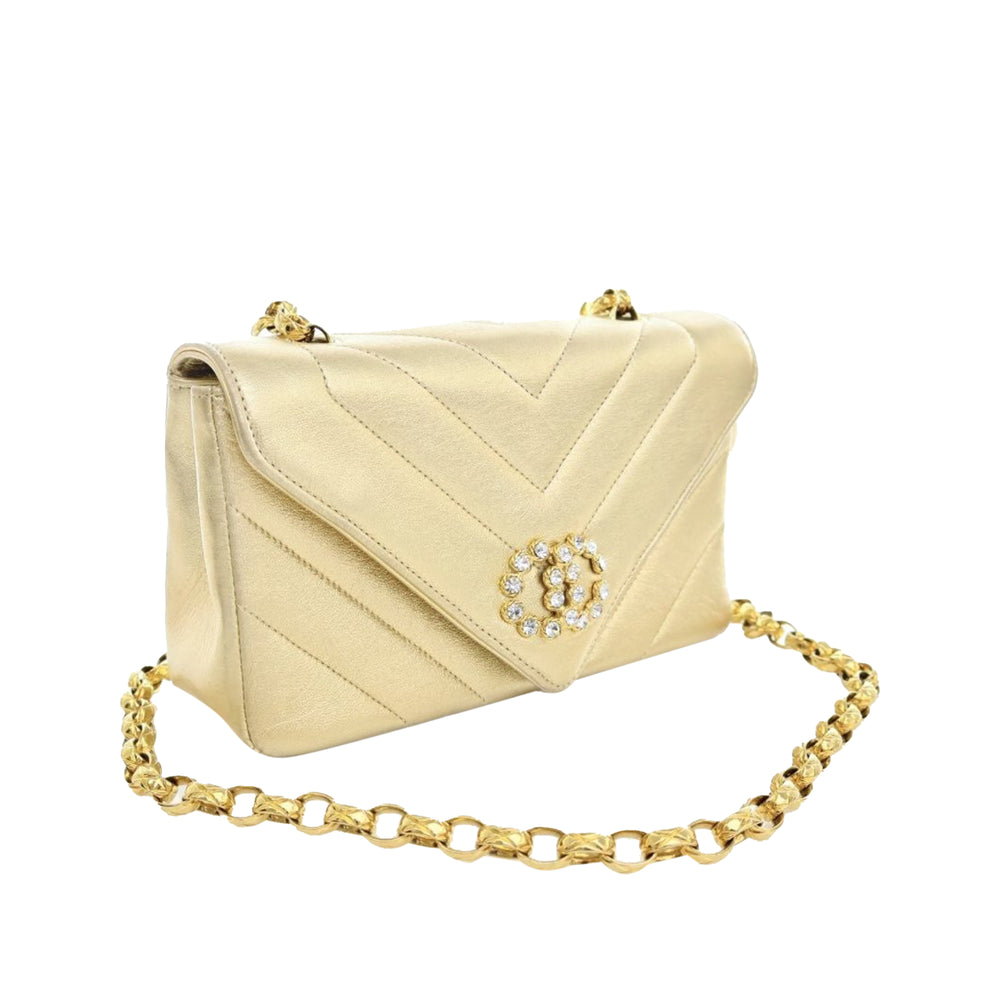 Small Chevron Metallic Lambskin V Stitch Bijoux Flap Gold - Gaby Paris