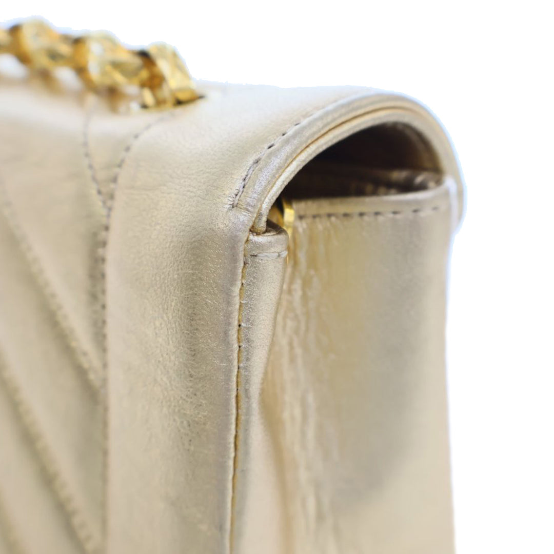 Small Chevron Metallic Lambskin V Stitch Bijoux Flap Gold - Gaby Paris