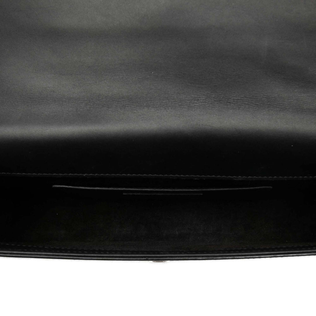 Cassandre Pompon Pochette Cuir de veau lisse Noir