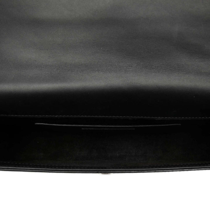 Cassandre Pompon Pochette Cuir de veau lisse Noir
