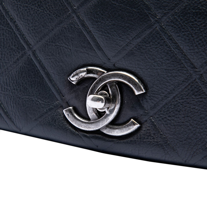 Chanel Small Diamond embossé Cuir de veau New Chic à rabat