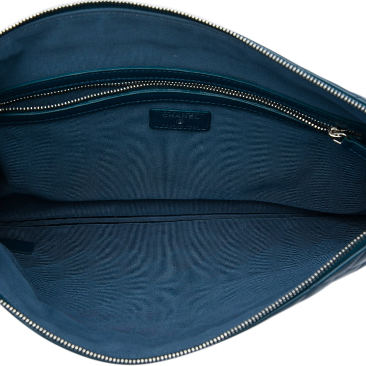 Matelassé O Étui Pochette Grand Cuir d'agneau Bleu