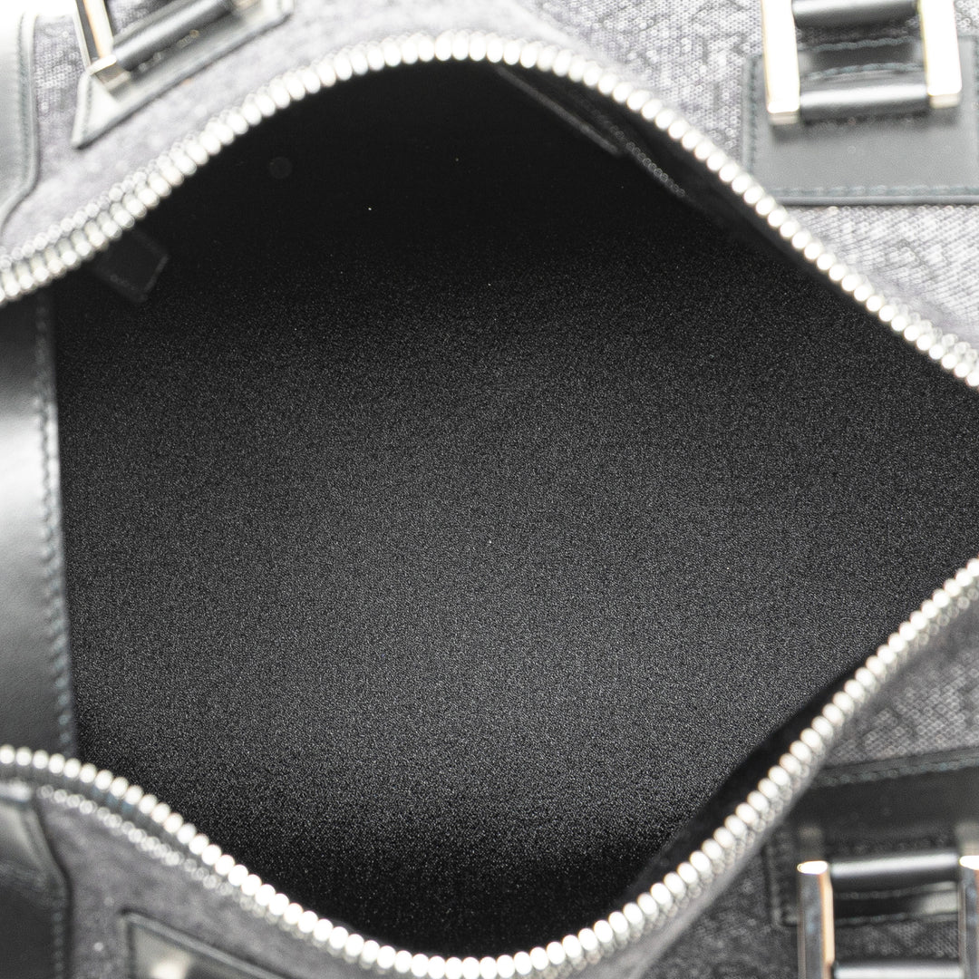 Logomania Denim Cylinder Handbag Black - Gaby Paris