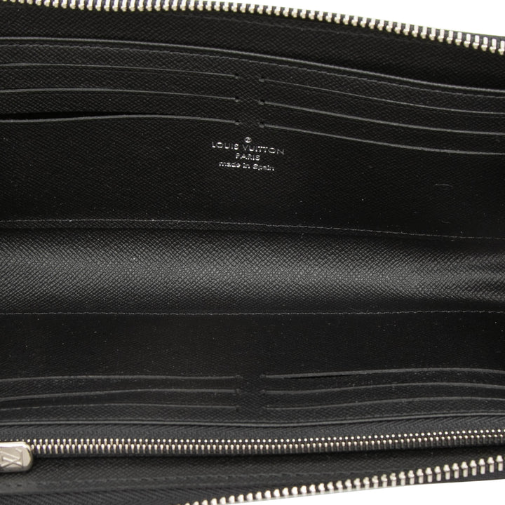 Louis Vuitton Taiga Zippy Dragonne Portefeuille