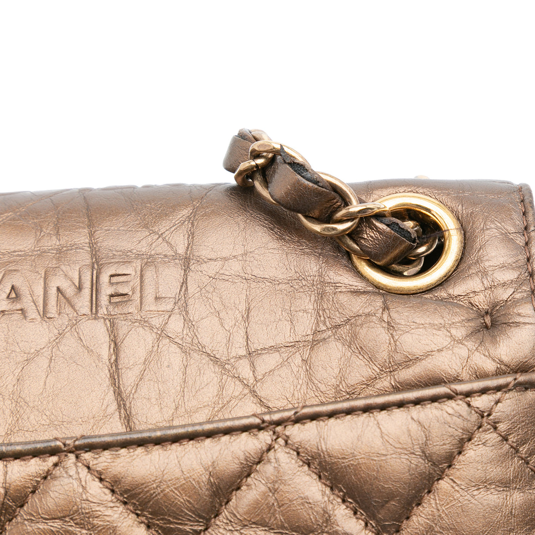 Chanel Paris Dallas Métallisé Cuir de veau Embossed Logo Flap Marron – GABY PARIS Authentique