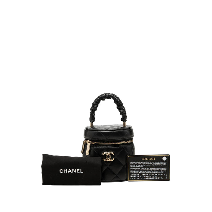 Chanel Matelassé Ruched Poignée Vanity Mini Cuir d'agneau Noir – vue 8 – GABY PARIS