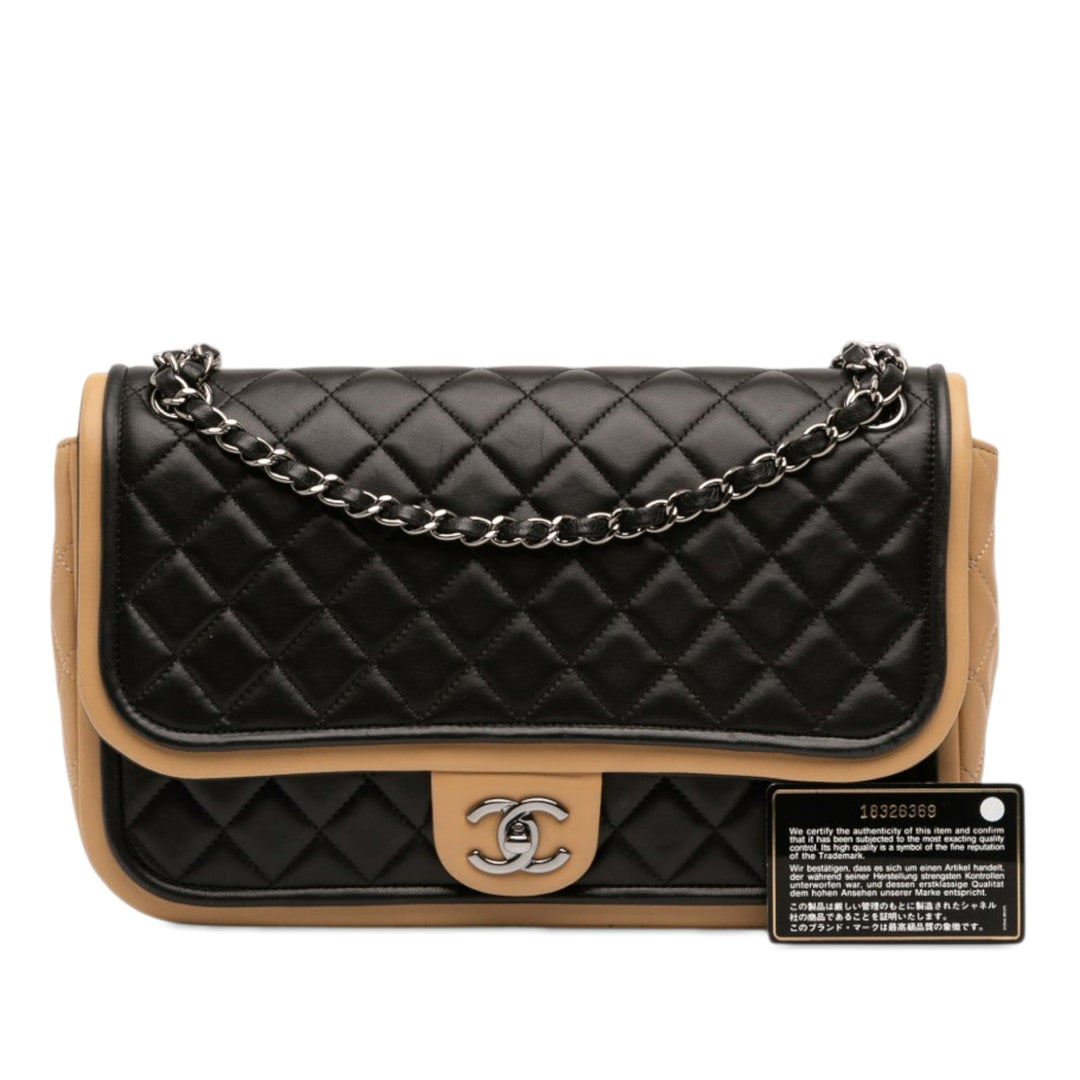 Chanel Jumbo Classic Bicolor Cuir d’agneau Twist à rabat