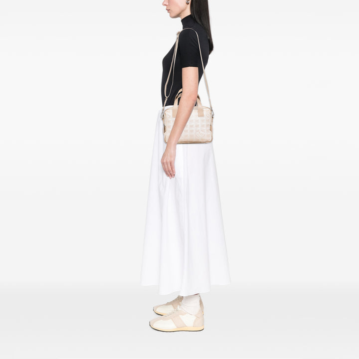 Chanel New Travel Line Nylon Sac cartable Marron – GABY PARIS Authentique