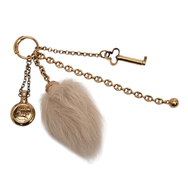 Chloé plaqué Chloe Symbols et Shearling Tail Bijou de sac