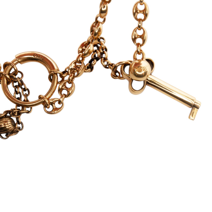Chloé plaqué Chloe Symbols et Shearling Tail Bijou de sac