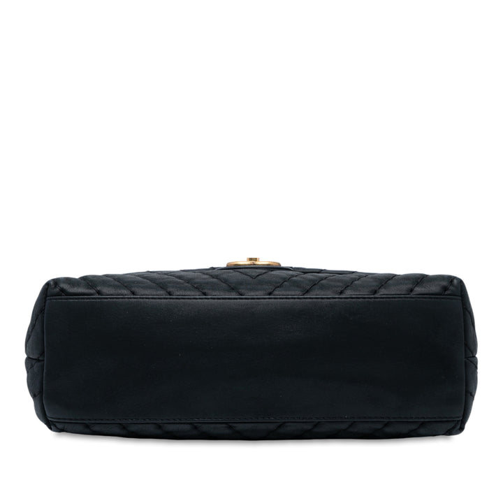 Chanel Large Chevron Iridescent Cuir de veau Surpique Flap Noir