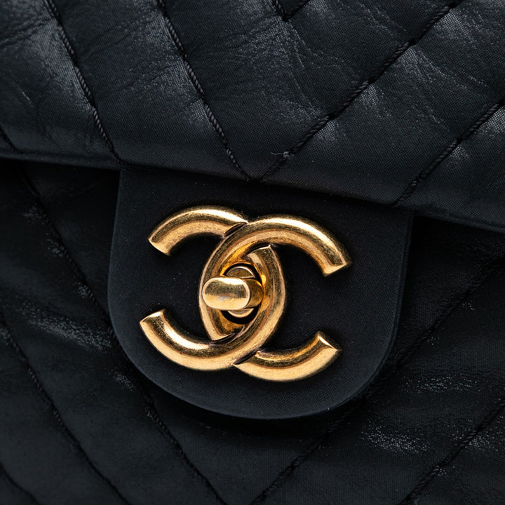 Chanel Large Chevron Iridescent Cuir de veau Surpique Flap Noir