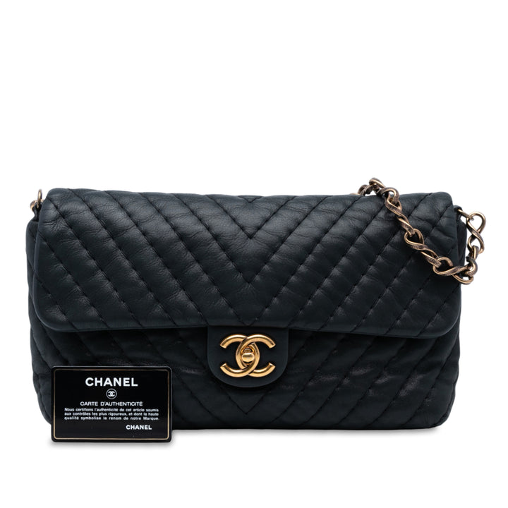 Chanel Large Chevron Iridescent Cuir de veau Surpique Flap Noir
