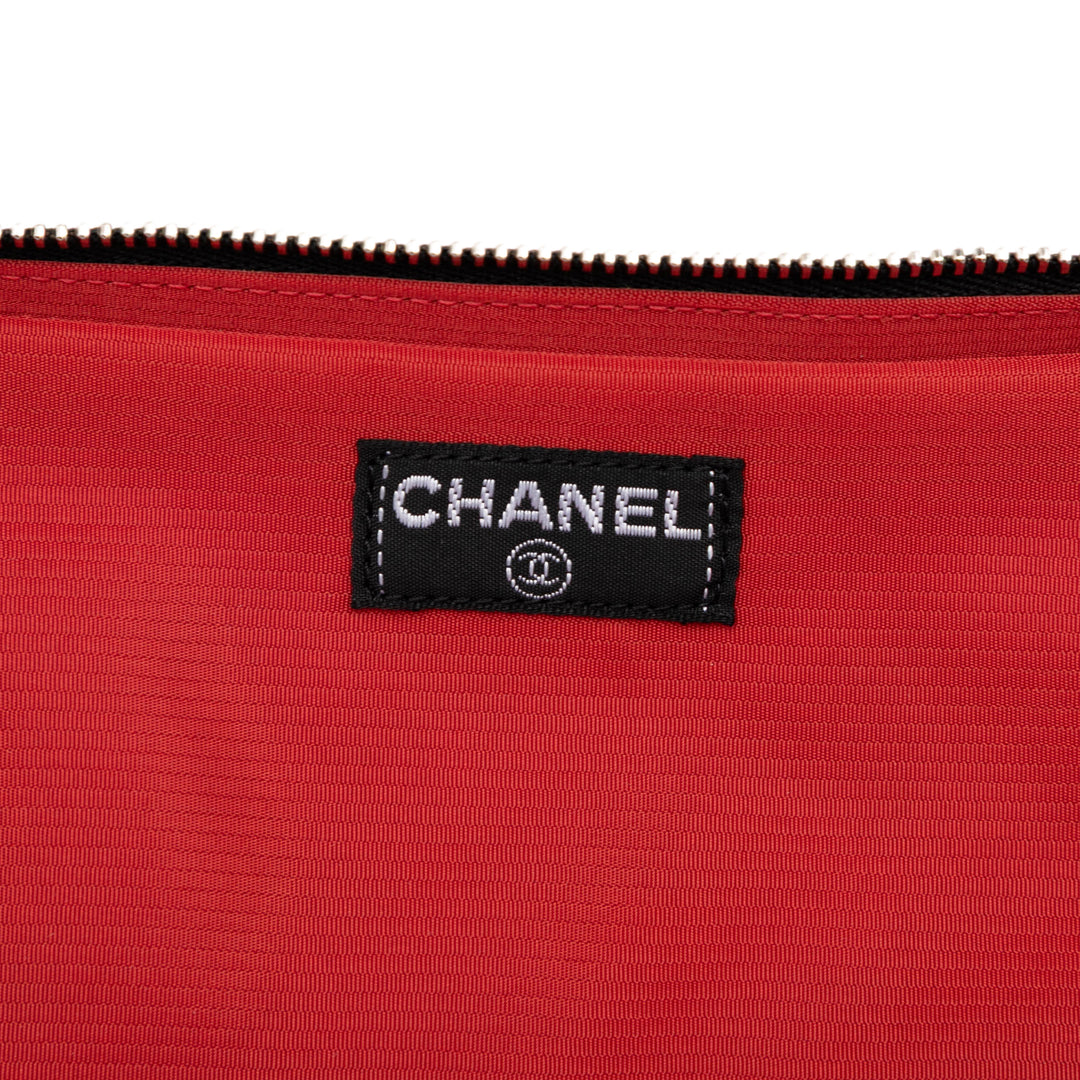 Chanel Old Travel Line Nylon Pochette Noir – GABY PARIS Authentique