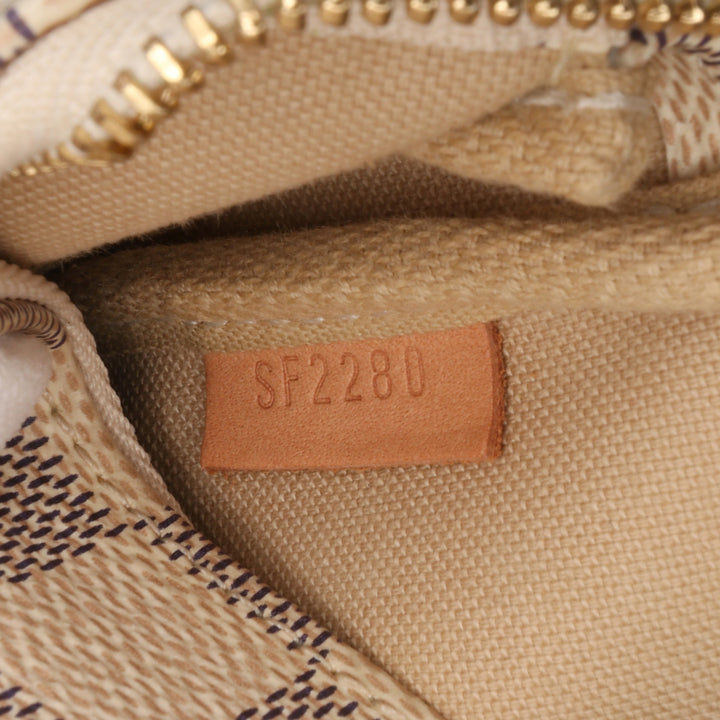 Damier Azur Mini Pochette Accessoires White - Gaby Paris