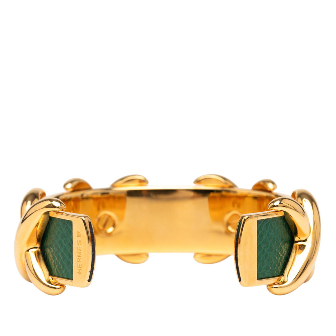 Hermès Doré Plated and Cuir Criss Cross Cuff Bracelet Doré – GABY PARIS Authentique