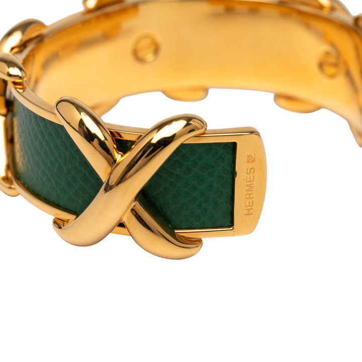 Hermès Doré Plated and Cuir Criss Cross Cuff Bracelet Doré – GABY PARIS Authentique