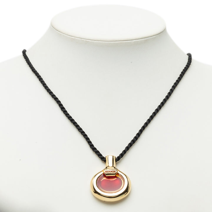 Hermès plaqué et Lacquered Parfum Bottle Pendant Collier Doré – vue 5 – GABY PARIS