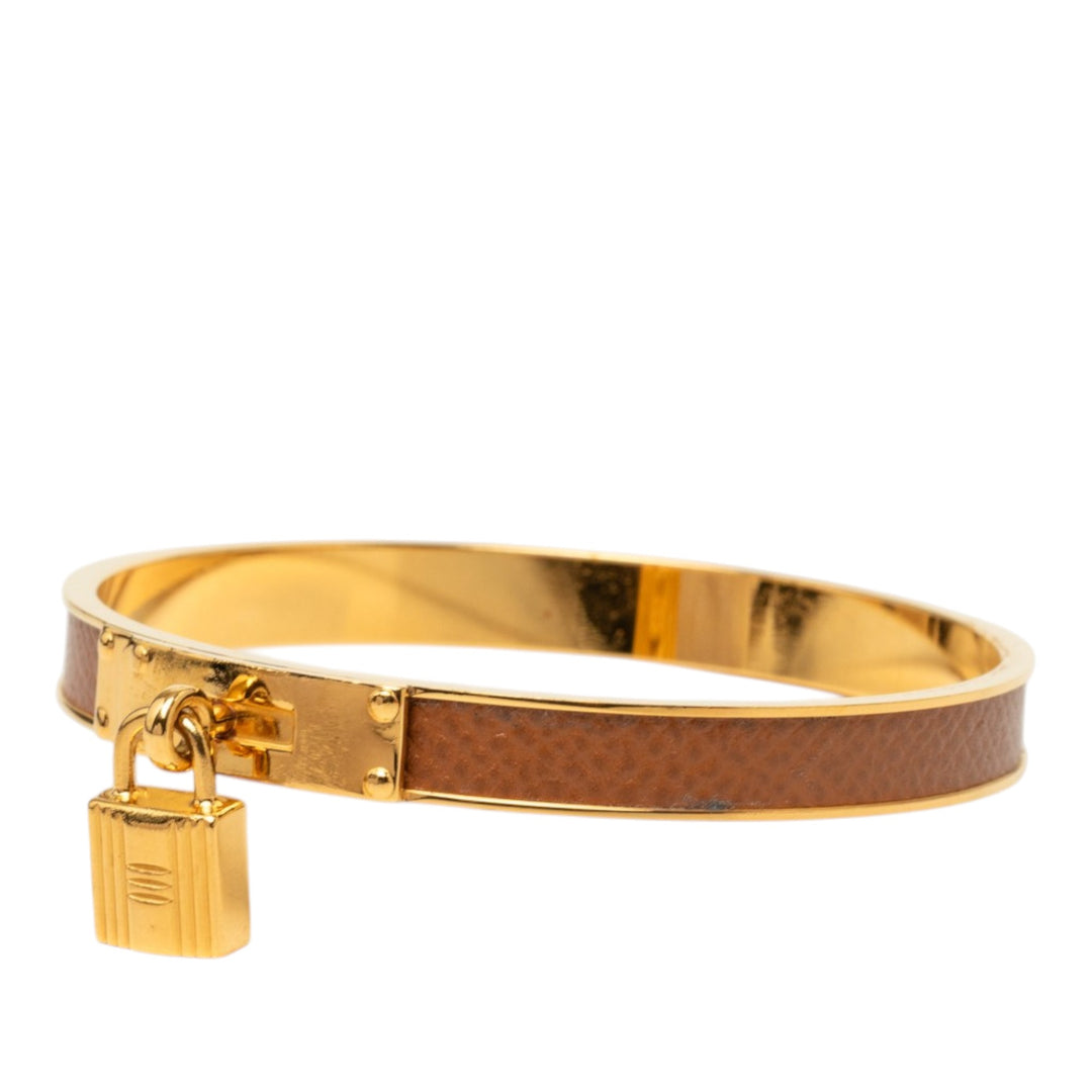 Hermès plaqué Kelly Cadena Lock Bangle Bracelet Epsom Doré – vue 2 – GABY PARIS