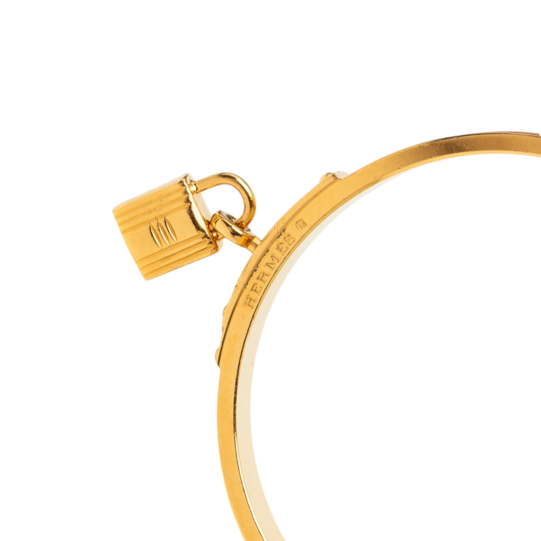 Hermès plaqué Kelly Cadena Lock Bangle Bracelet Epsom Doré – vue 4 – GABY PARIS
