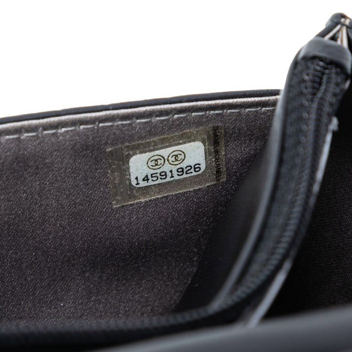 Chanel CC embossé Cuir d’agneau Camellia Wallet on Chain