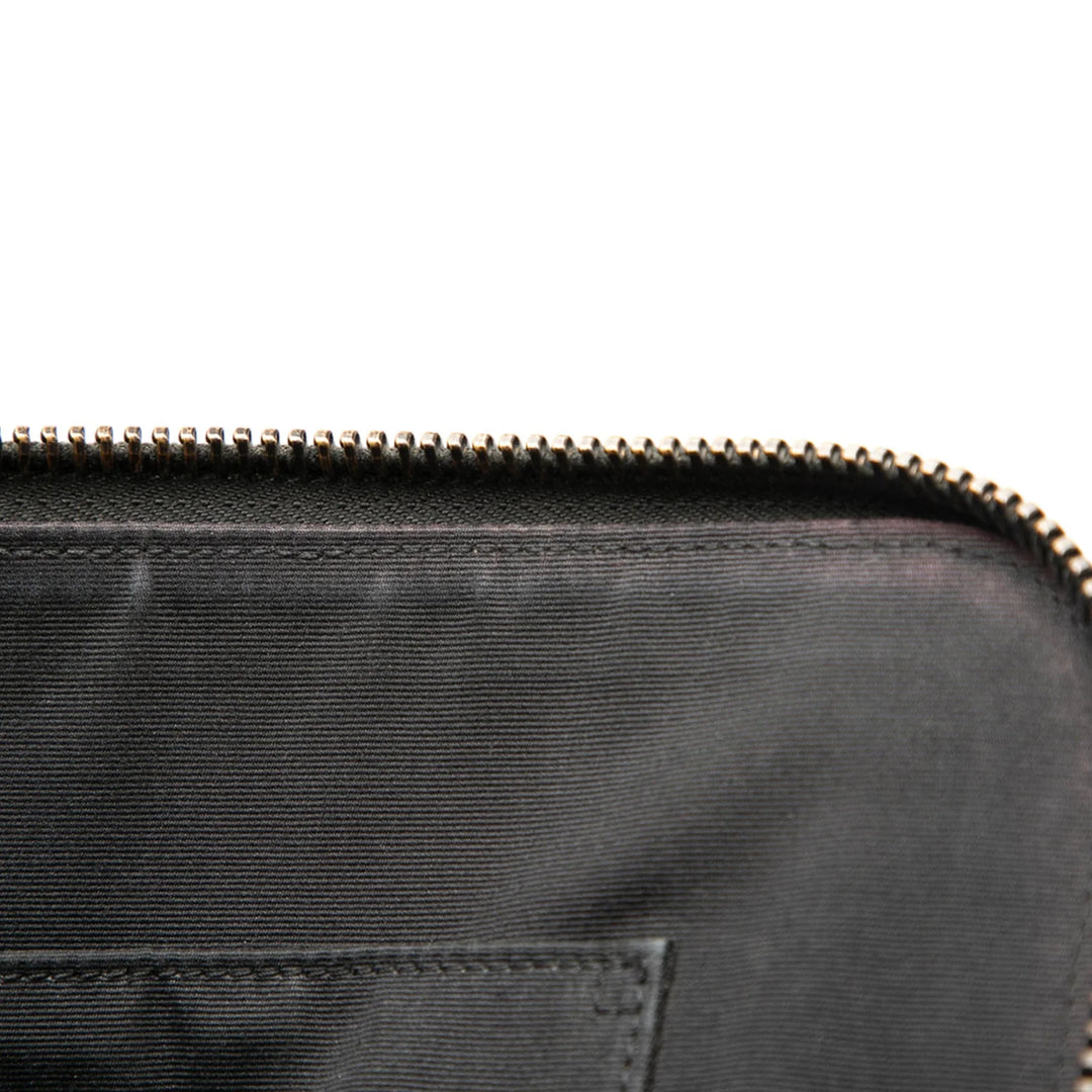 Saint Laurent Pochette en cuir façon croco noir