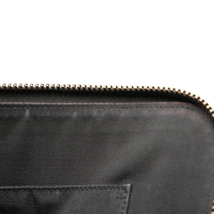 Saint Laurent Pochette en cuir façon croco noir
