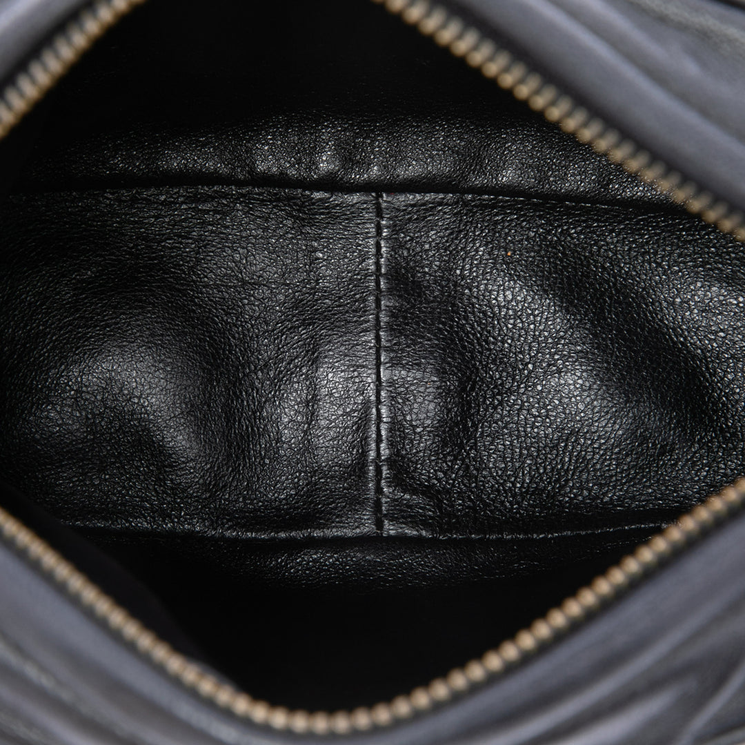 Chanel CC Matelassé Pompon Sac caméra Cuir d'agneau Noir