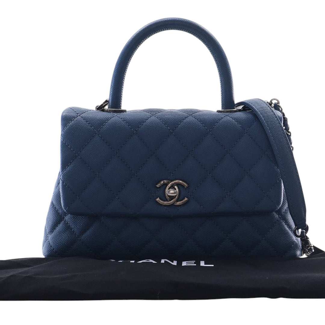 Chanel Matelassé Coco sac à Mini Cuir caviar