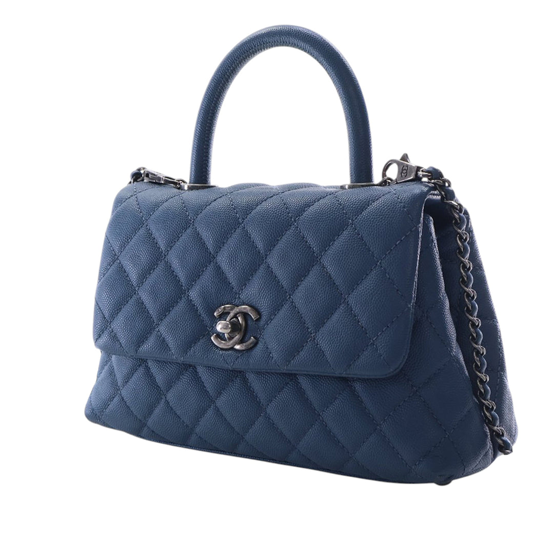 Chanel Matelassé Coco sac à Mini Cuir caviar
