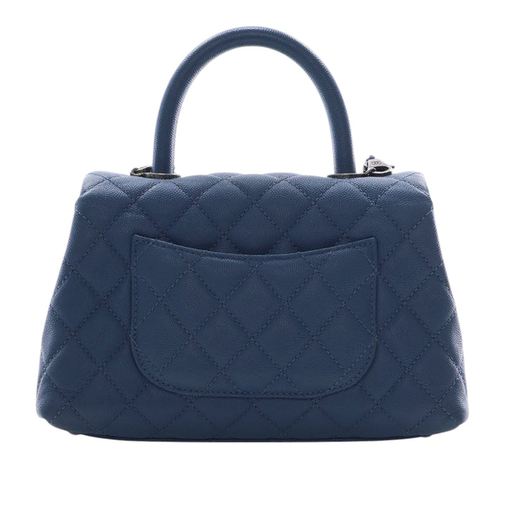Chanel Matelassé Coco sac à Mini Cuir caviar