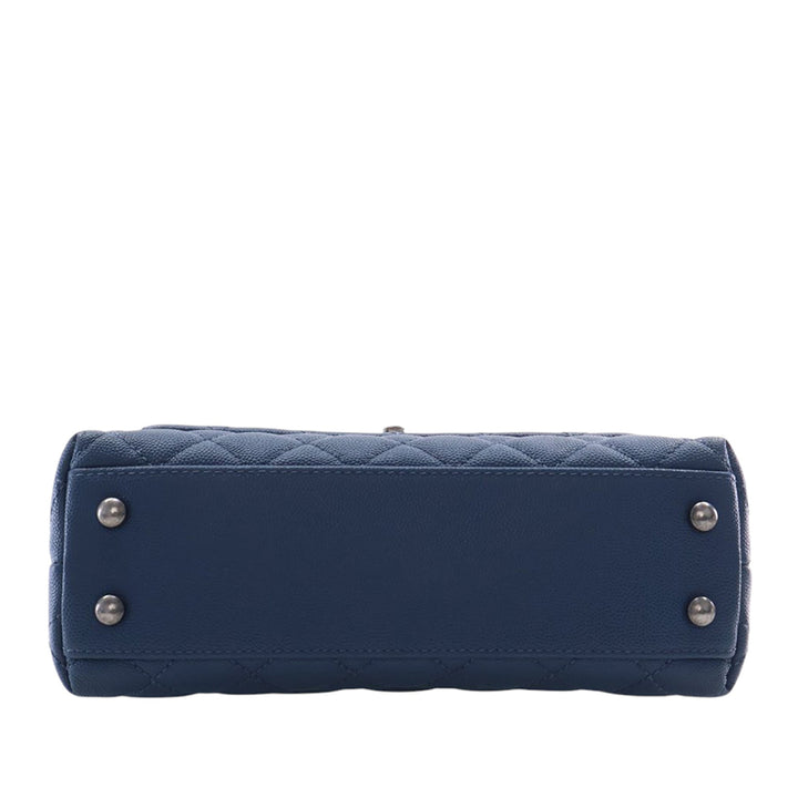 Chanel Matelassé Coco sac à Mini Cuir caviar