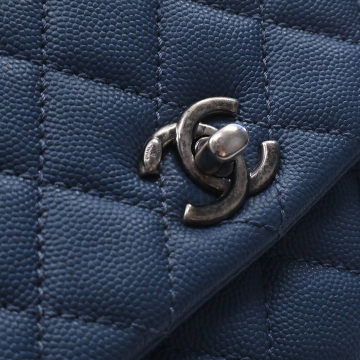 Chanel Matelassé Coco sac à Mini Cuir caviar