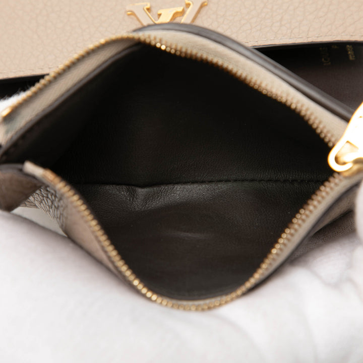 Louis Vuitton Taurillon Capucines Compact Portefeuille