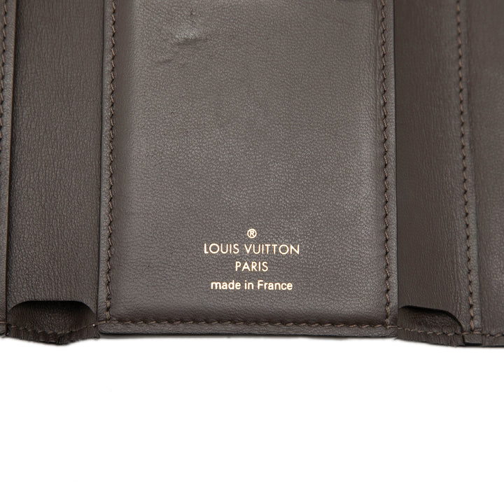 Louis Vuitton Taurillon Capucines Compact Portefeuille