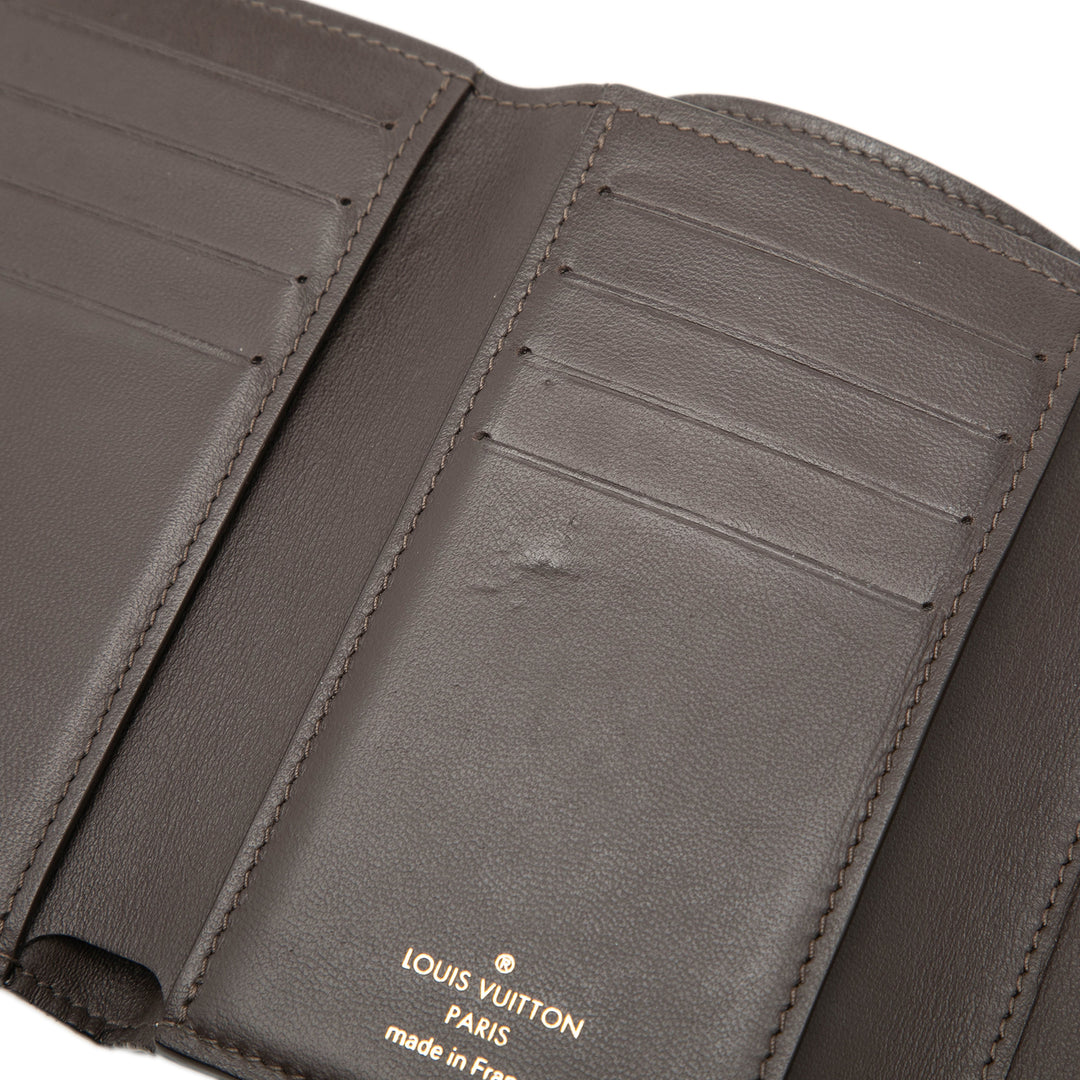 Louis Vuitton Taurillon Capucines Compact Portefeuille