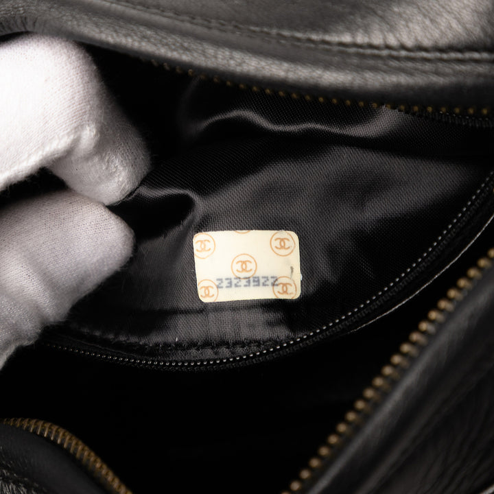 Chanel CC Quilted Cuir d’agneau Tassel Sac caméra Noir – GABY PARIS Authentique